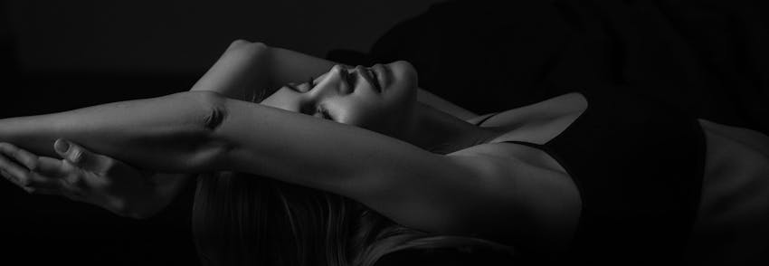 woman laying on her back