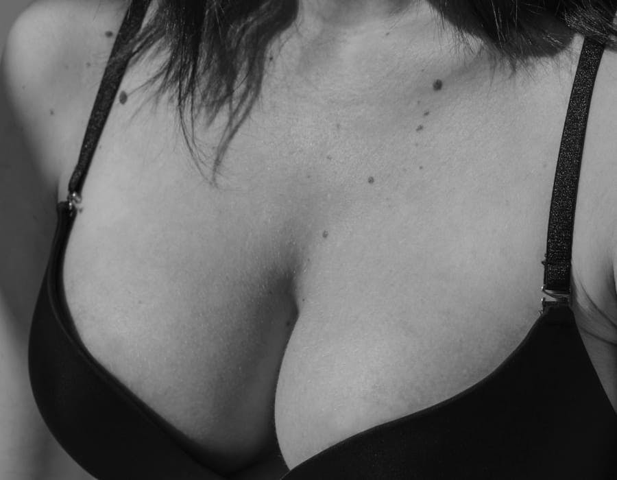 woman in a black bra