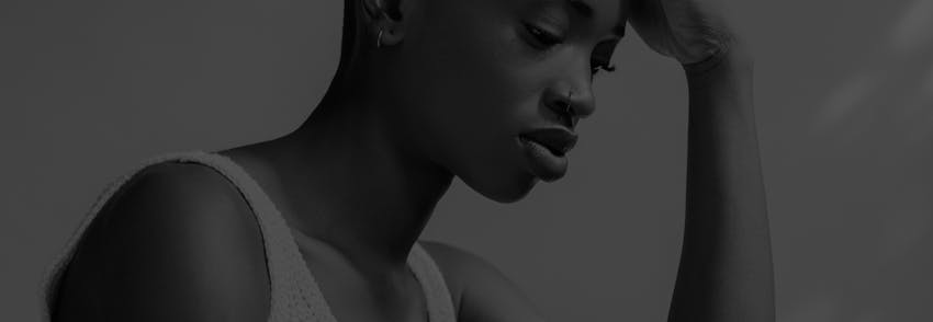 woman holding her head