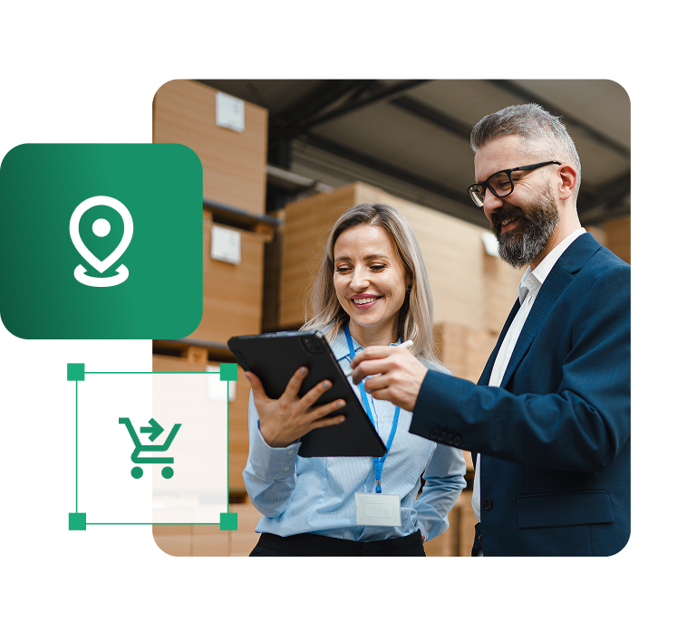 Dwoje pracowników zarządzających magazynem e-commerce przy użyciu tabletu z systemem WMS IdoSell