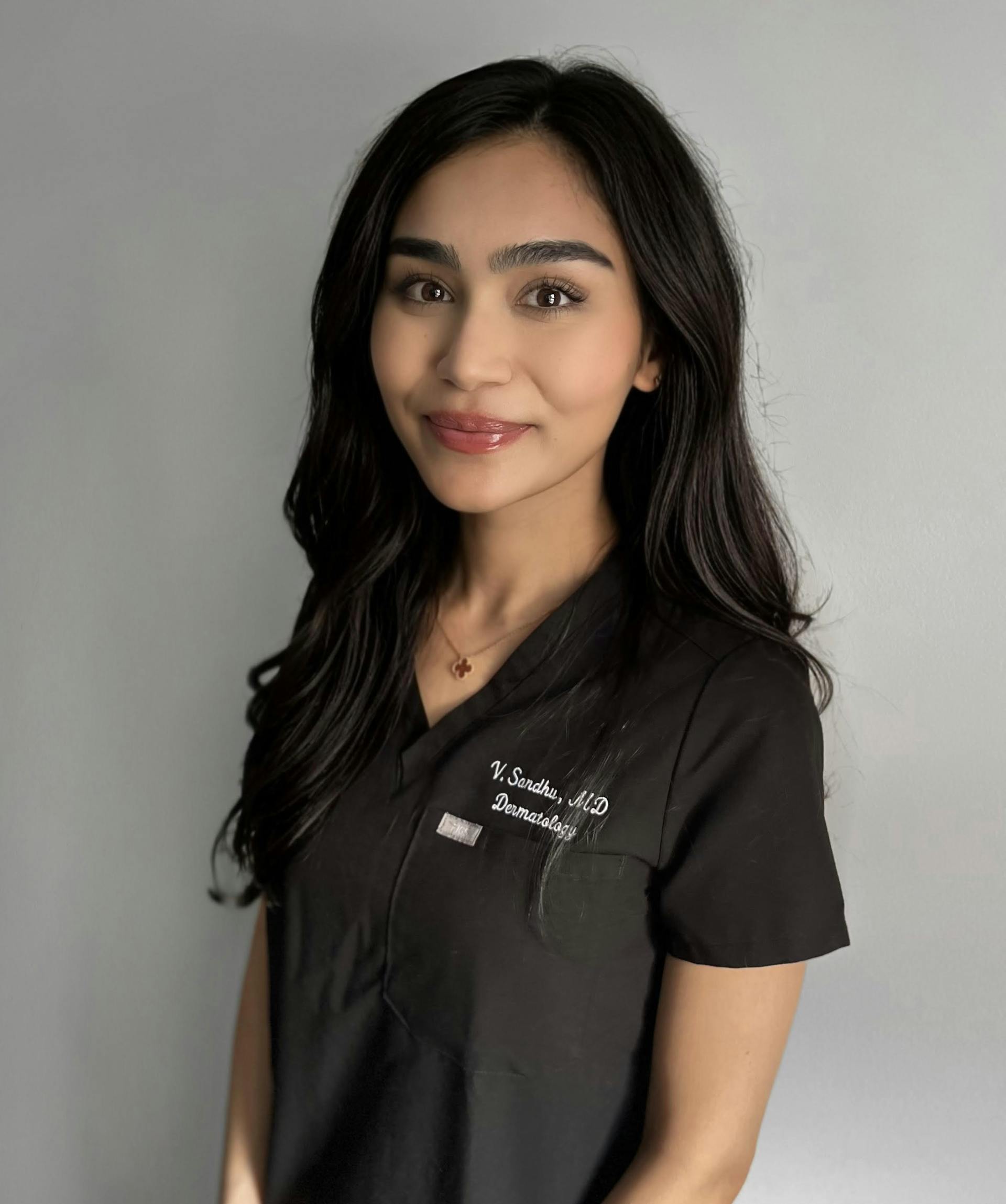woman in underwear sitting on ground