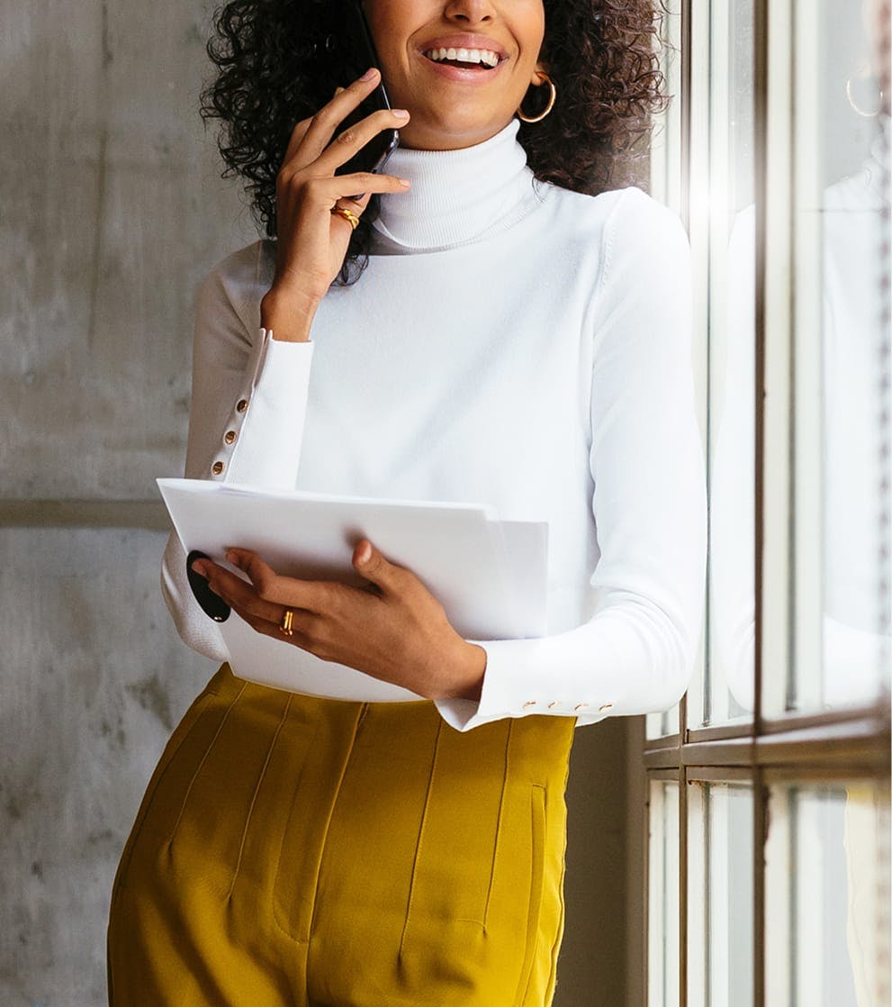 Woman on the phone smiling