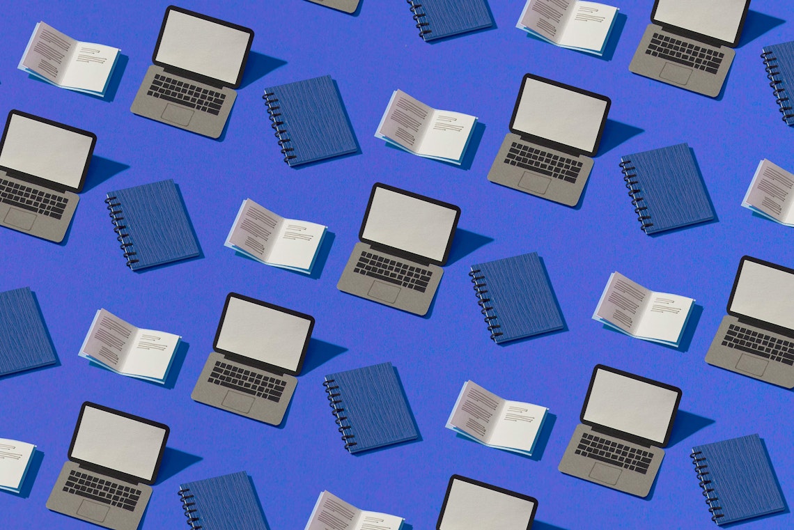 A picture of computers and books