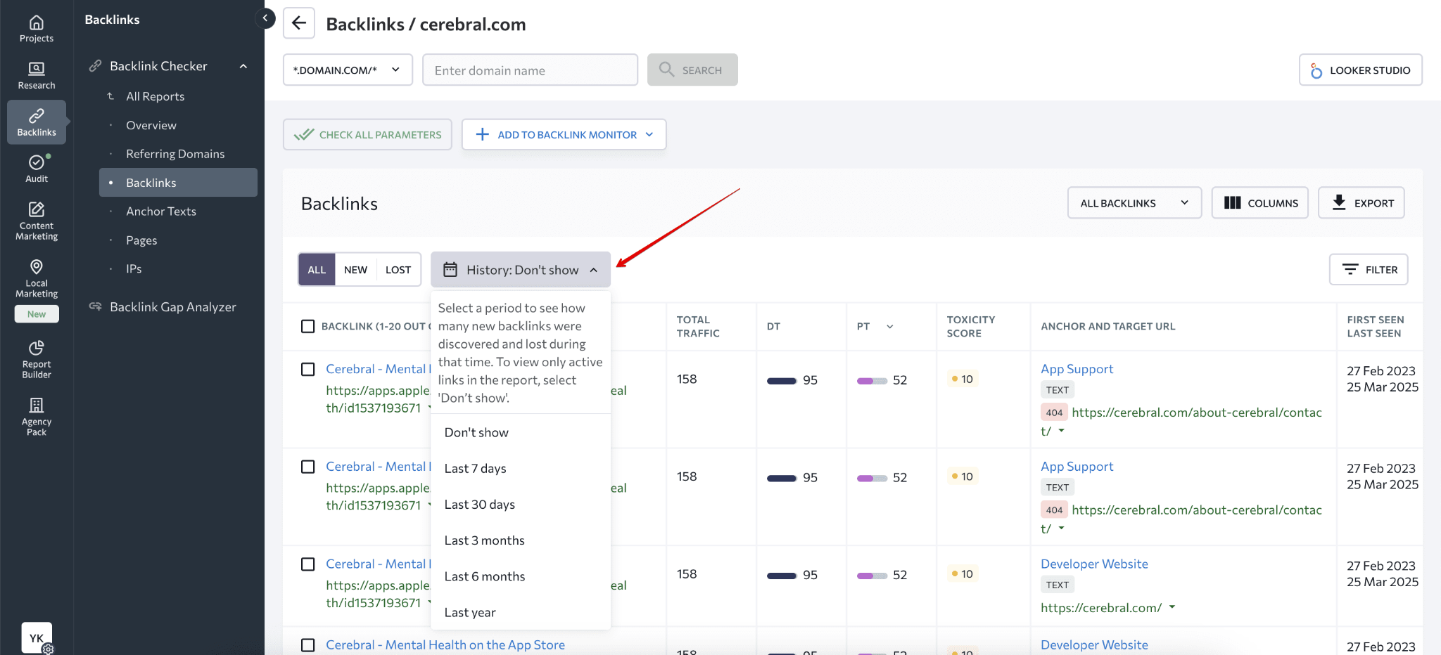 [Screenshot: A backlink report showing lost referring domains over the past 30 days, sorted by domain authority]