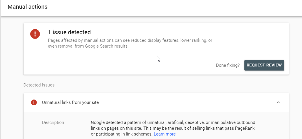 [Screenshot: Google Search Console showing the Manual Actions panel with an unnatural links warning]