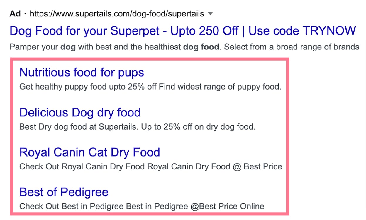 [Screenshot: A Google Ads result with paid sitelink extensions showing beneath the ad]