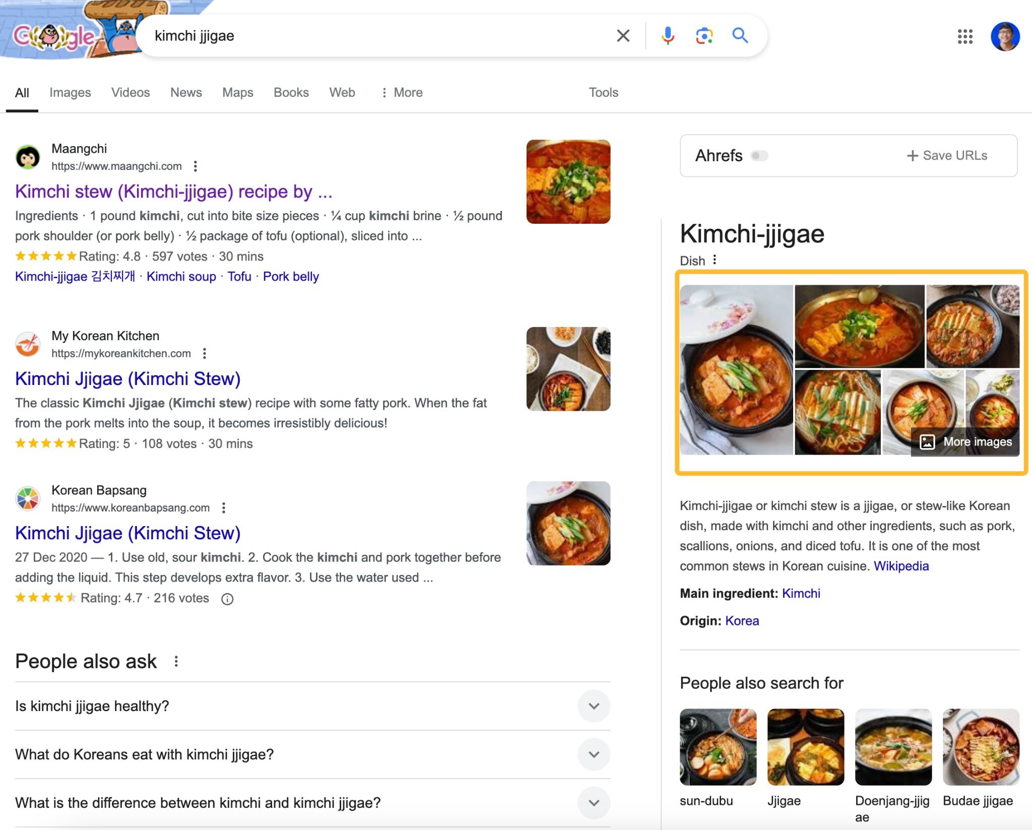 [Screenshot of Google Knowledge Panel for a food entity like &ldquo;kimchi jjigae&rdquo; showing images and related recipes]