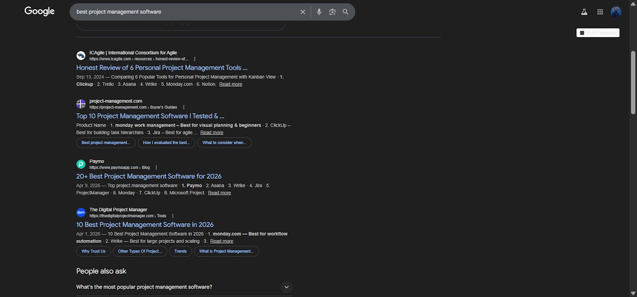 [Screenshot: Google SERP for &ldquo;best project management software&rdquo; showing listicle results from review sites, indicating comparison/list intent]