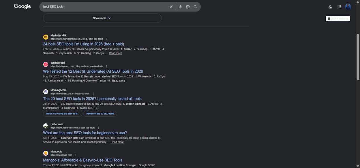 [Screenshot of Google SERP for &ldquo;best SEO tools&rdquo; showing a mix of listicles and comparison articles]