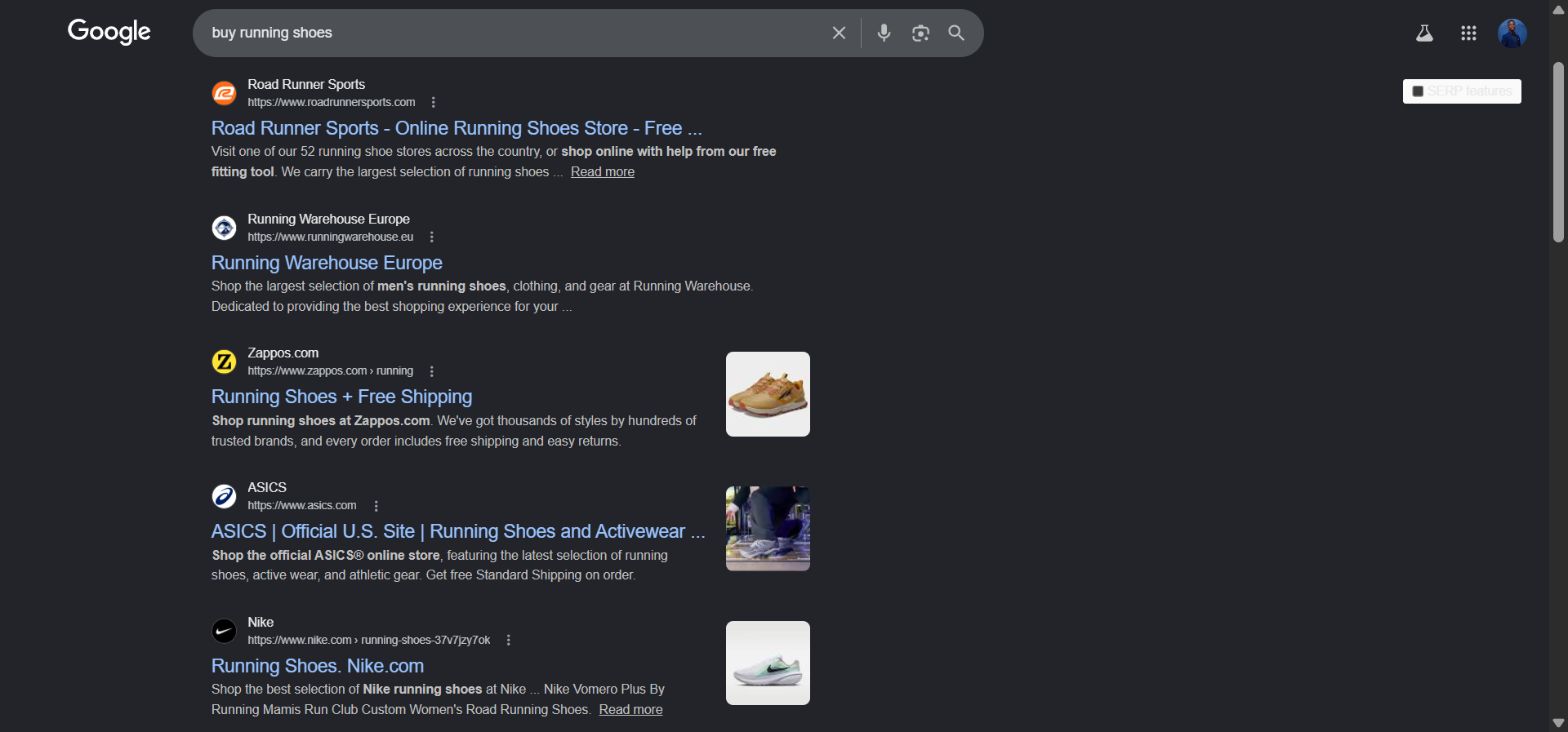 [Screenshot description: Google SERP for &ldquo;buy running shoes&rdquo; with three Sponsored ads at the top, labeled with arrows]
