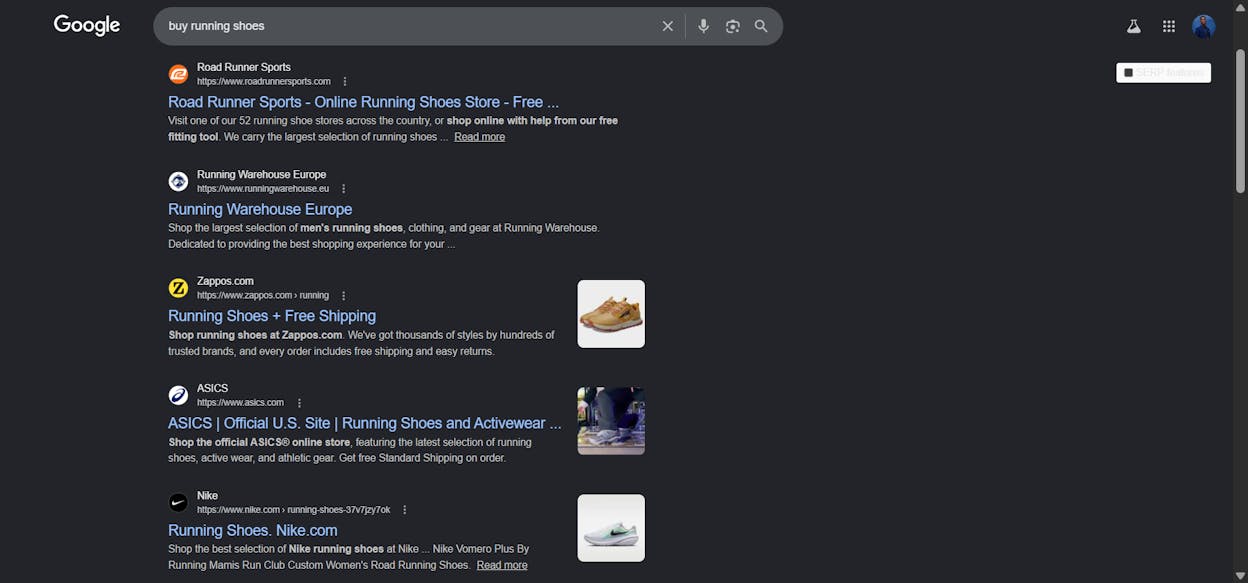 [Screenshot description: Google SERP for &ldquo;buy running shoes&rdquo; with three Sponsored ads at the top, labeled with arrows]