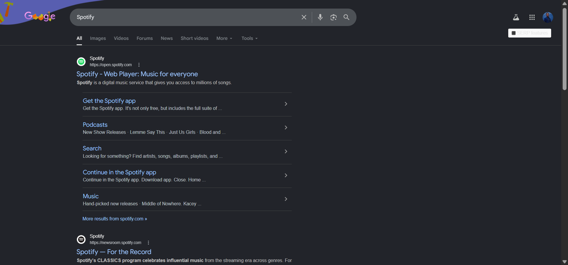 [Screenshot description: Google SERP for &ldquo;Spotify&rdquo; showing the main organic result with six sitelinks underneath, linking to Premium, Download, and Login pages]