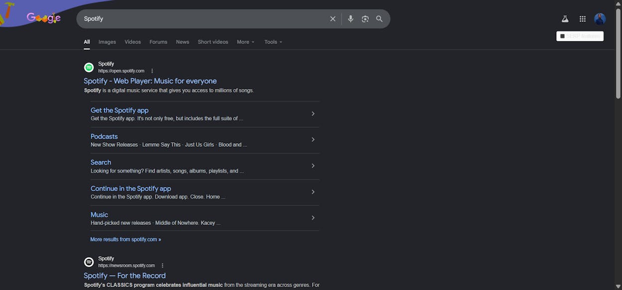 [Screenshot description: Google SERP for &ldquo;Spotify&rdquo; showing the main organic result with six sitelinks underneath, linking to Premium, Download, and Login pages]