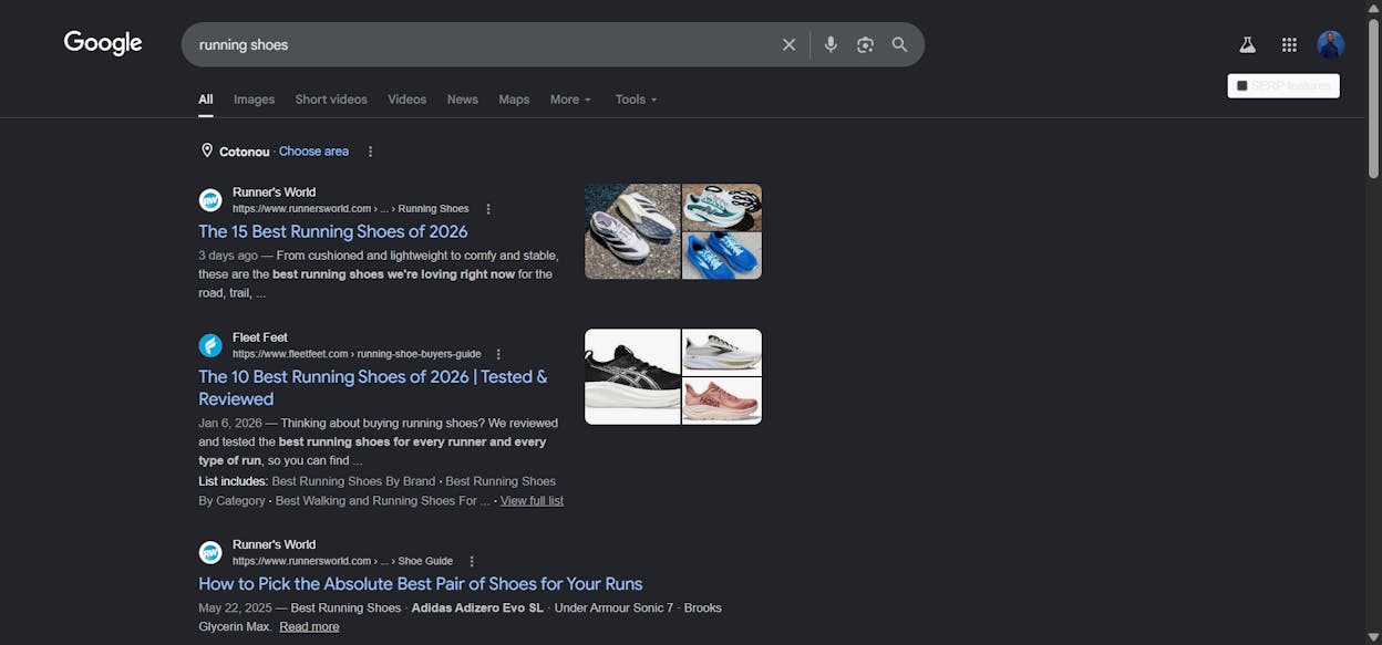 [Screenshot: A Google search results page for a query like &ldquo;running shoes&rdquo; with the four sponsored ad slots highlighted at the top.]