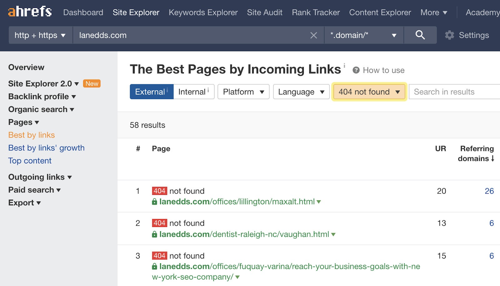 Ahrefs Site Explorer Best by links report with 404 status filter applied, showing dead URLs ranked by referring domains