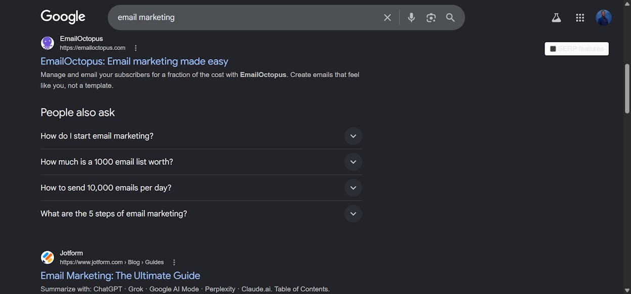 Google search results page for &ldquo;email marketing&rdquo; with the People Also Ask section expanded showing 4 related questions