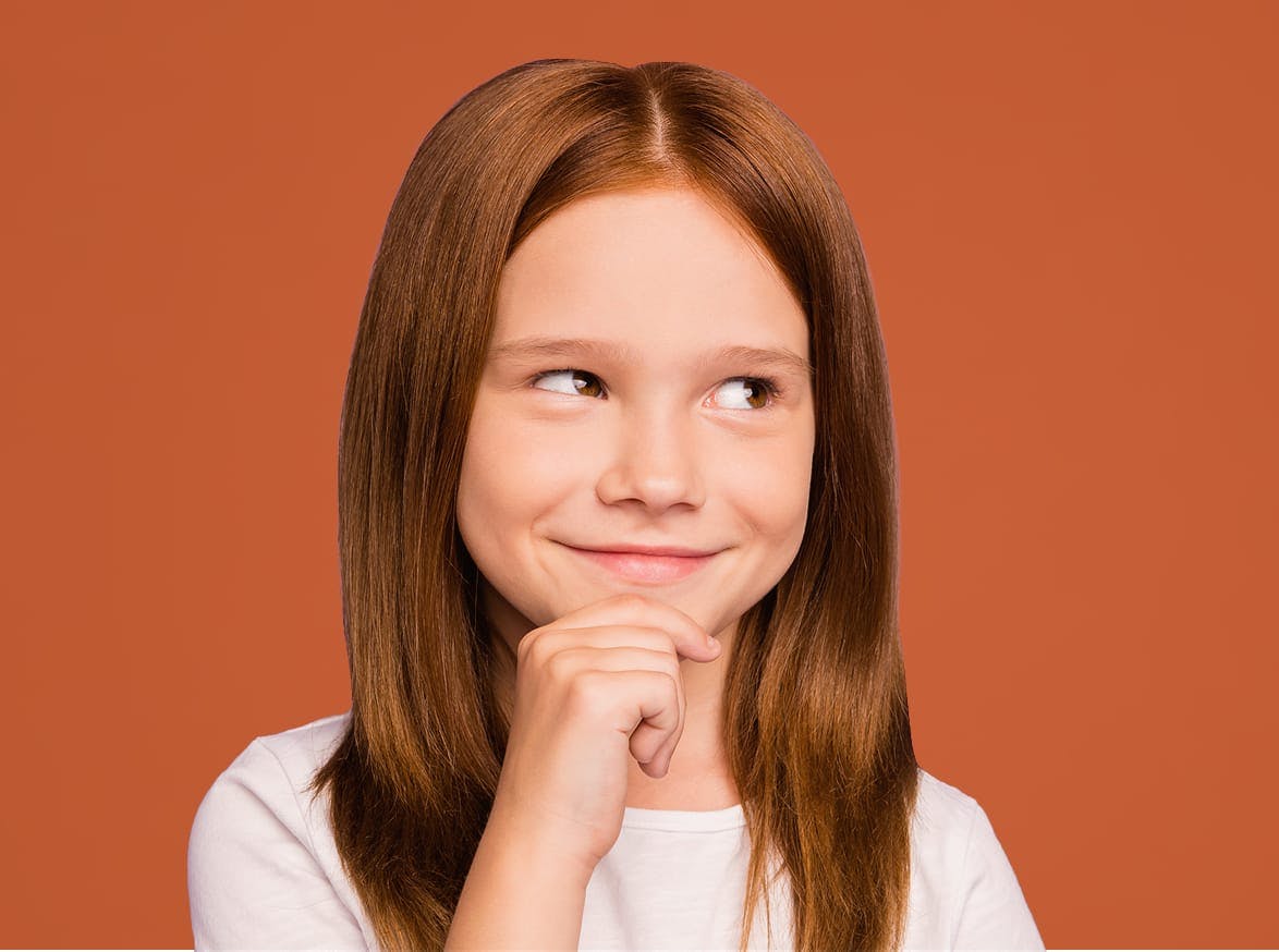 little girl touching her chin