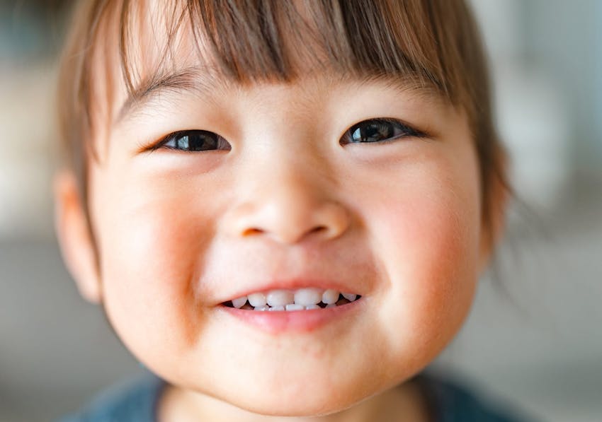 close up of kid smiling