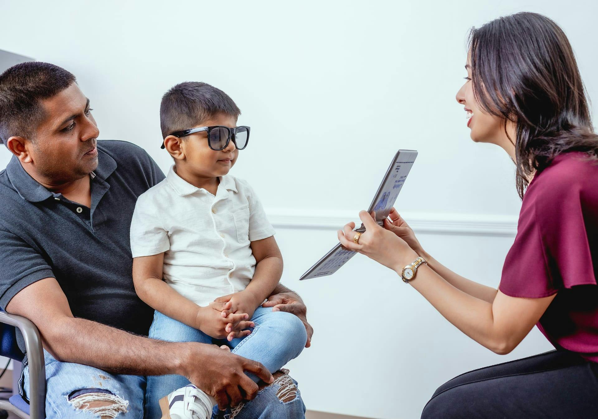 doctor examining a child patient