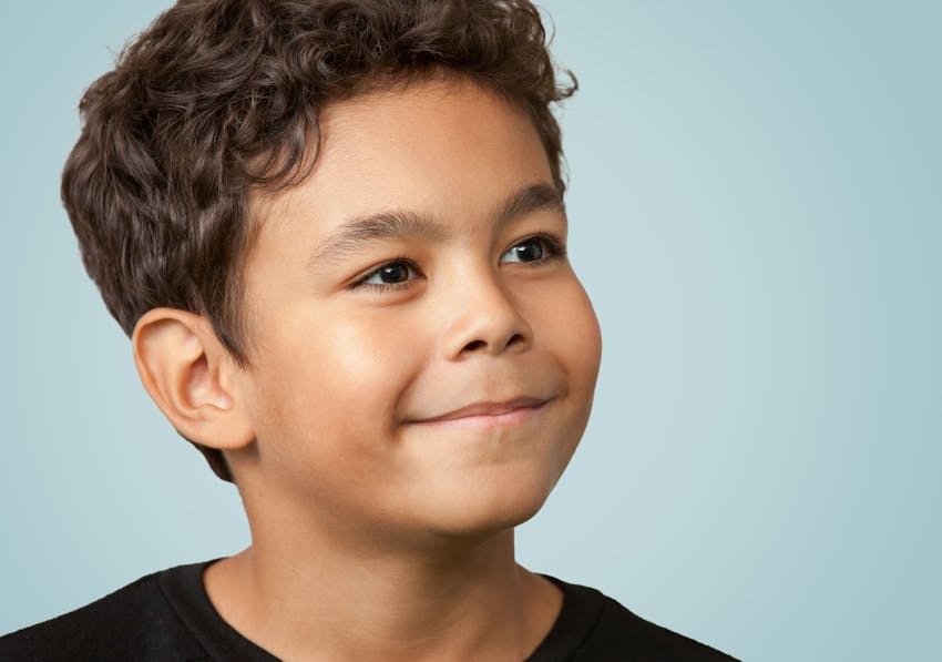 young boy smiling