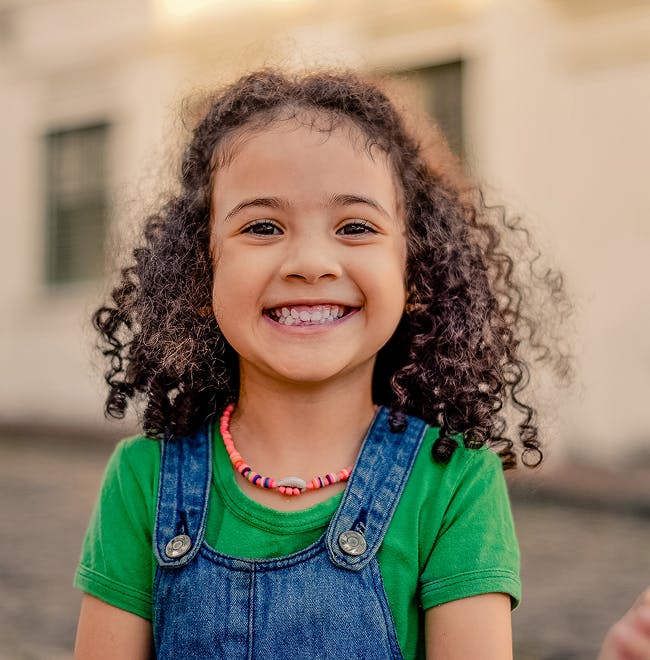 young girl with curly hair
