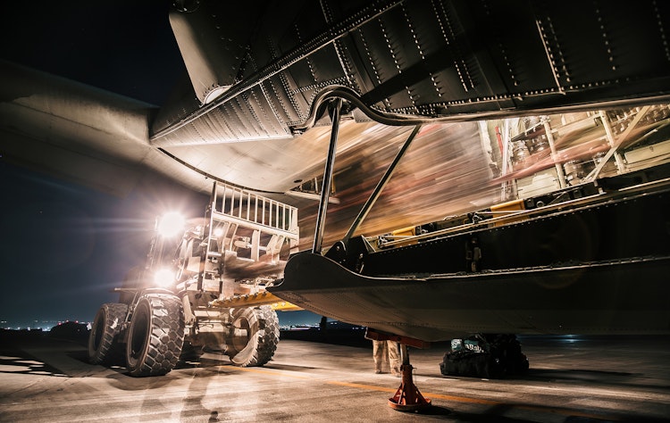 A timelapse of cargo being loaded onto a plane.