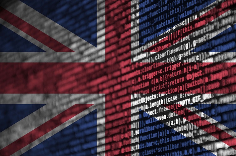 Union Jack flag overlaid with computer code, symbolising the UK's focus on cybersecurity and digital technology.