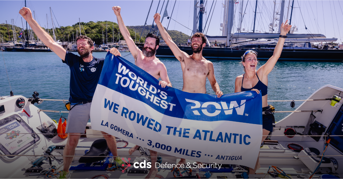Oarsome rowers team celebrating after rowing 3000 miles over the Atlantic