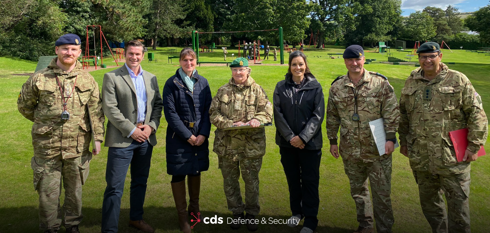 CDS DS personnel with ATC members stood in field