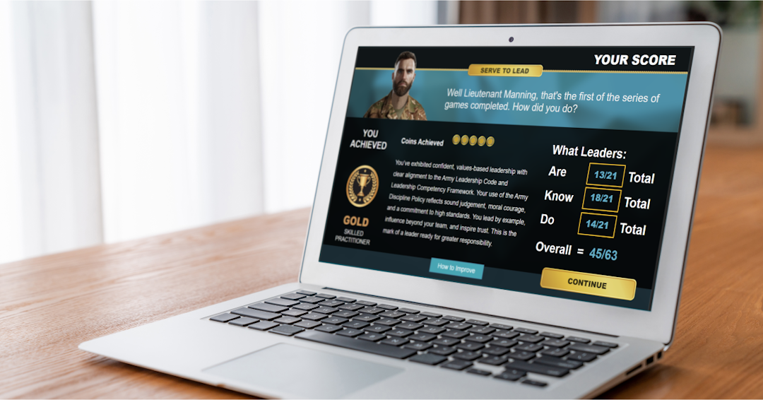 Laptop open on desk, displayed on screen is a snapshot of the score page of the Ethical Edge eLearning game.