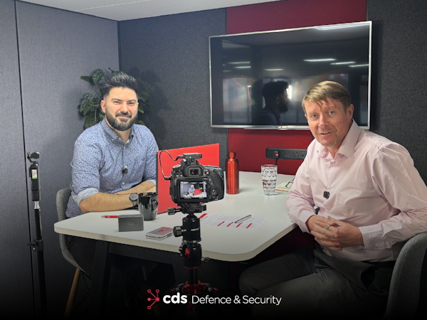 Podcast Episode 8 Karl Rees and Martin Nash smiling to camera on set of Episode 8 of the Briefing Room Podcast around Insider Threat