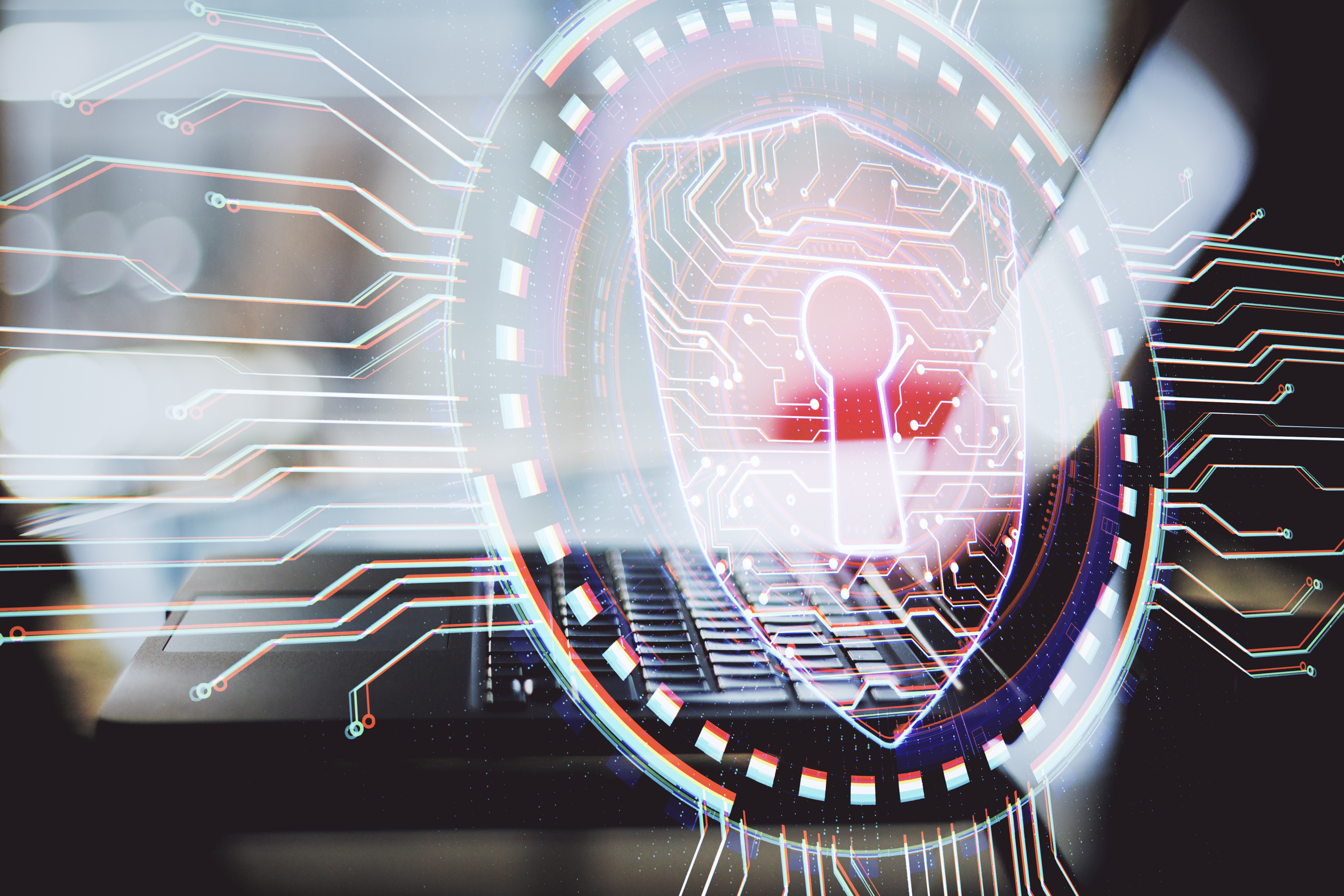 Abstract image shows a close up of a laptop and keyboard overlaid with a circular graphic depicting digital network connections and a padlock. The overall visual tone is sophisticated, with colors including red, white, and blue. This image could be used for projects related to computer security, data protection, technology, or network safety.