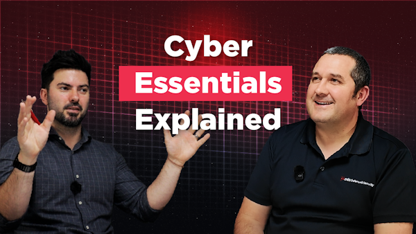 Thumbnail image for a podcast or video episode titled “Cyber Essentials Explained.” Karl Rees is pictured on the left wearing a dark blue shirt and gesturing with both hands while speaking. Michael Daly is pictured on the right wearing a black CDS Defence & Security polo shirt, smiling towards Karl. They are seated against a dark red digital grid background with large white and pink text displaying the episode title.