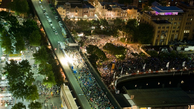 Aerial view of New Year’s Eve spectators on the closed Cahill Expressway and spectators packed into the Circular Quay foreshore.