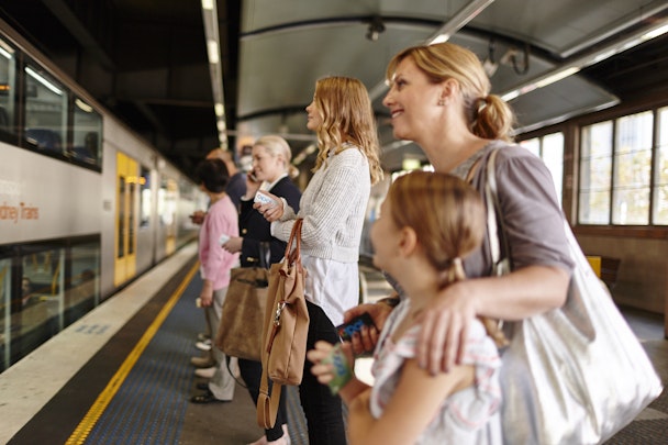 Commuters waiting for a train.