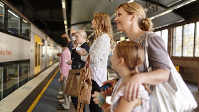 Commuters waiting for a train.