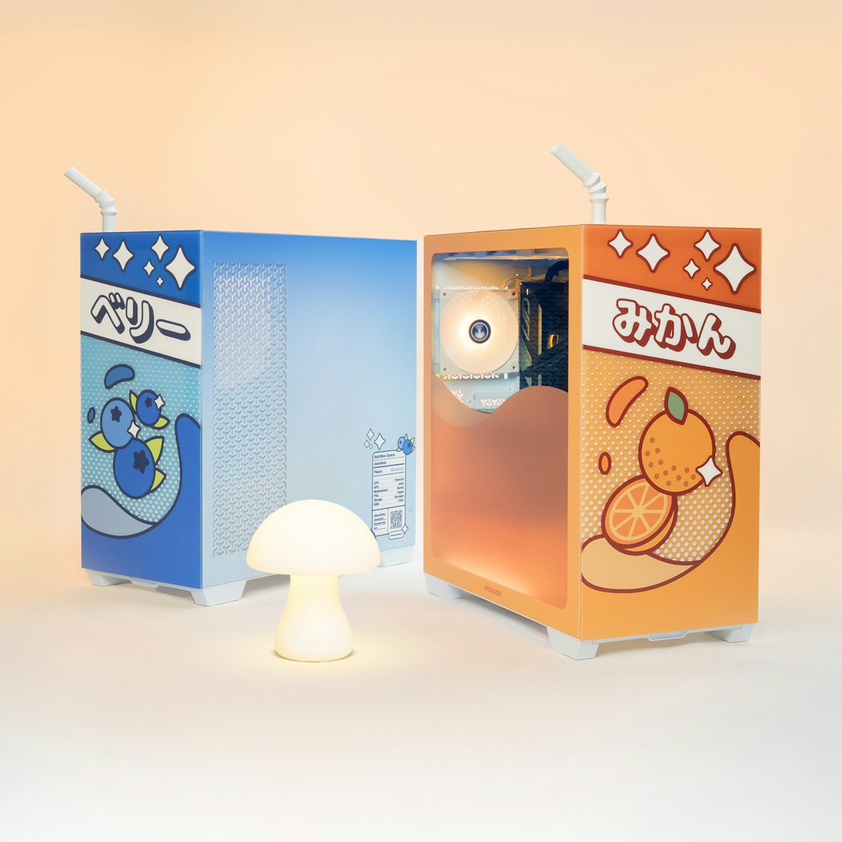 Ironside Juicebox gaming PCs in Blueberry and Orange, photographed with matching props