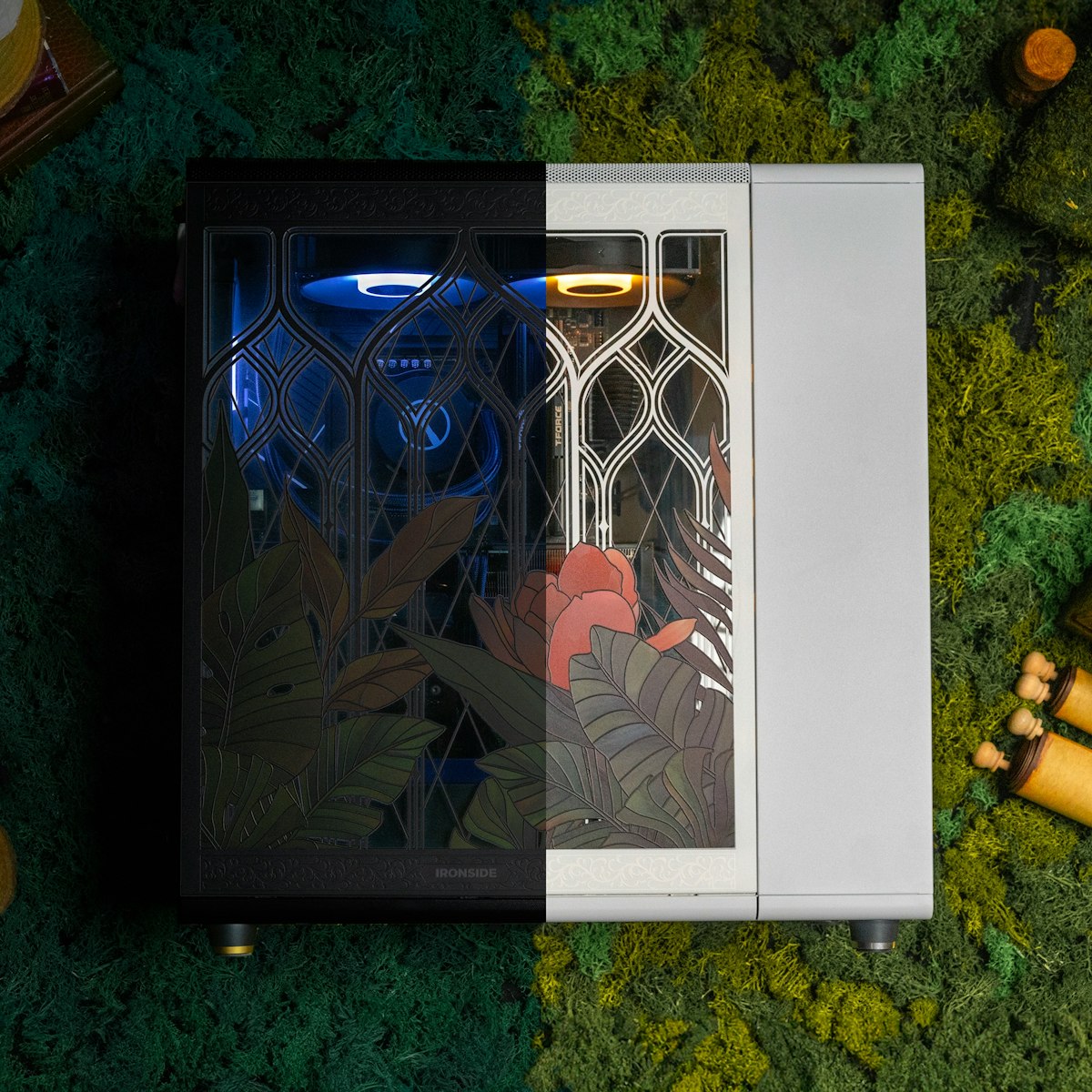Eden’s Veil in Frostvine and Ravenroot side by side on moss, the same botanical panel in its daylight and moonlit colorways
