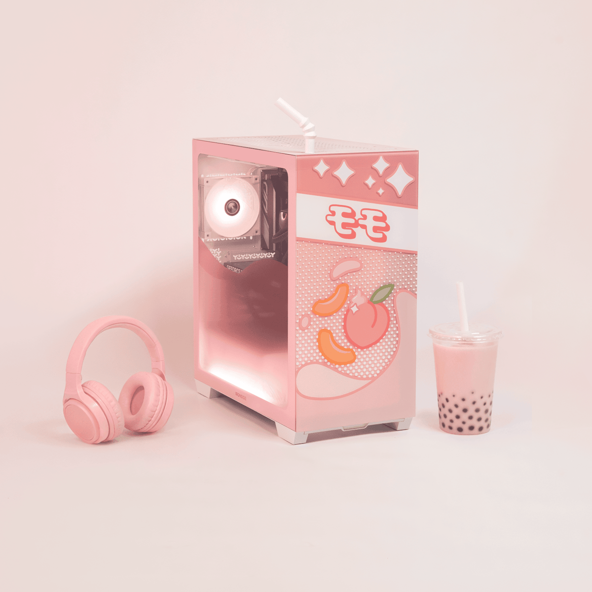 Ironside Juicebox Peaches & Cream gaming PC on a desk with pink headphones and a boba tea