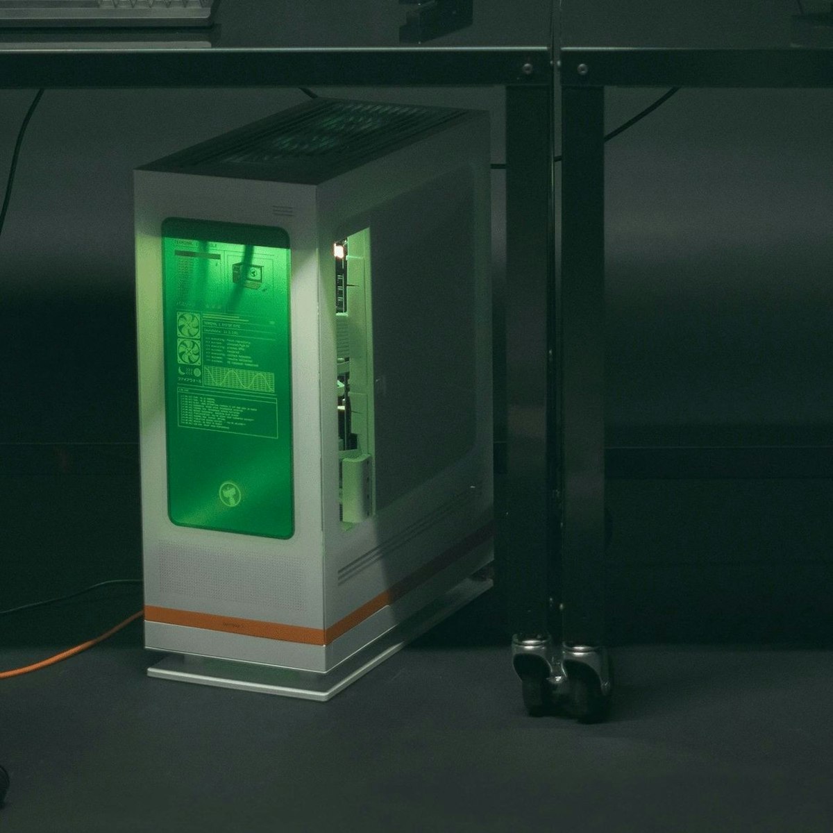Terminal 1 in White under a desk, its green control panel lit