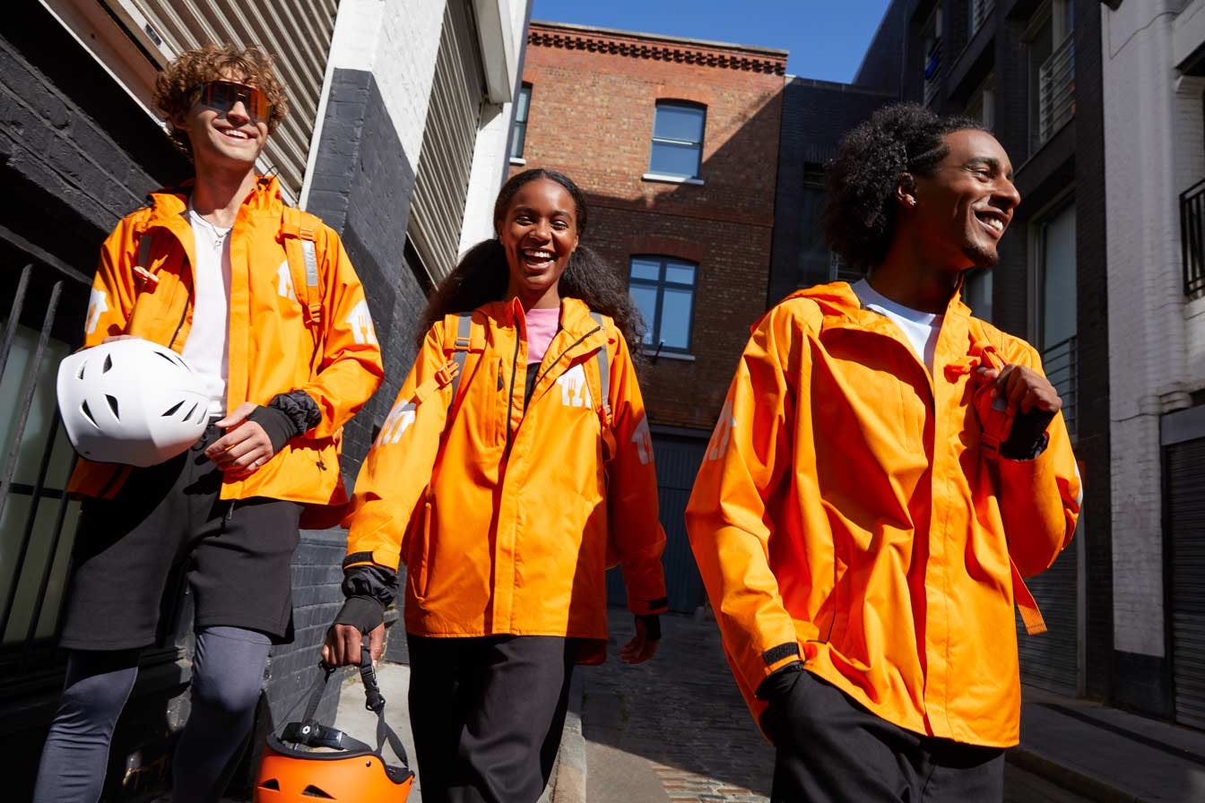 Just-Eats-UK-Couriers-Walking-Smiling-Deliverect-OV