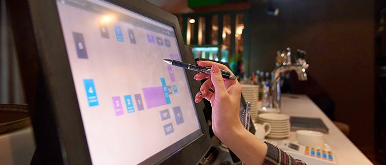Close up of a POS System in a Restaurant operation, how to scaleup your restaurant operation by Deliverect.