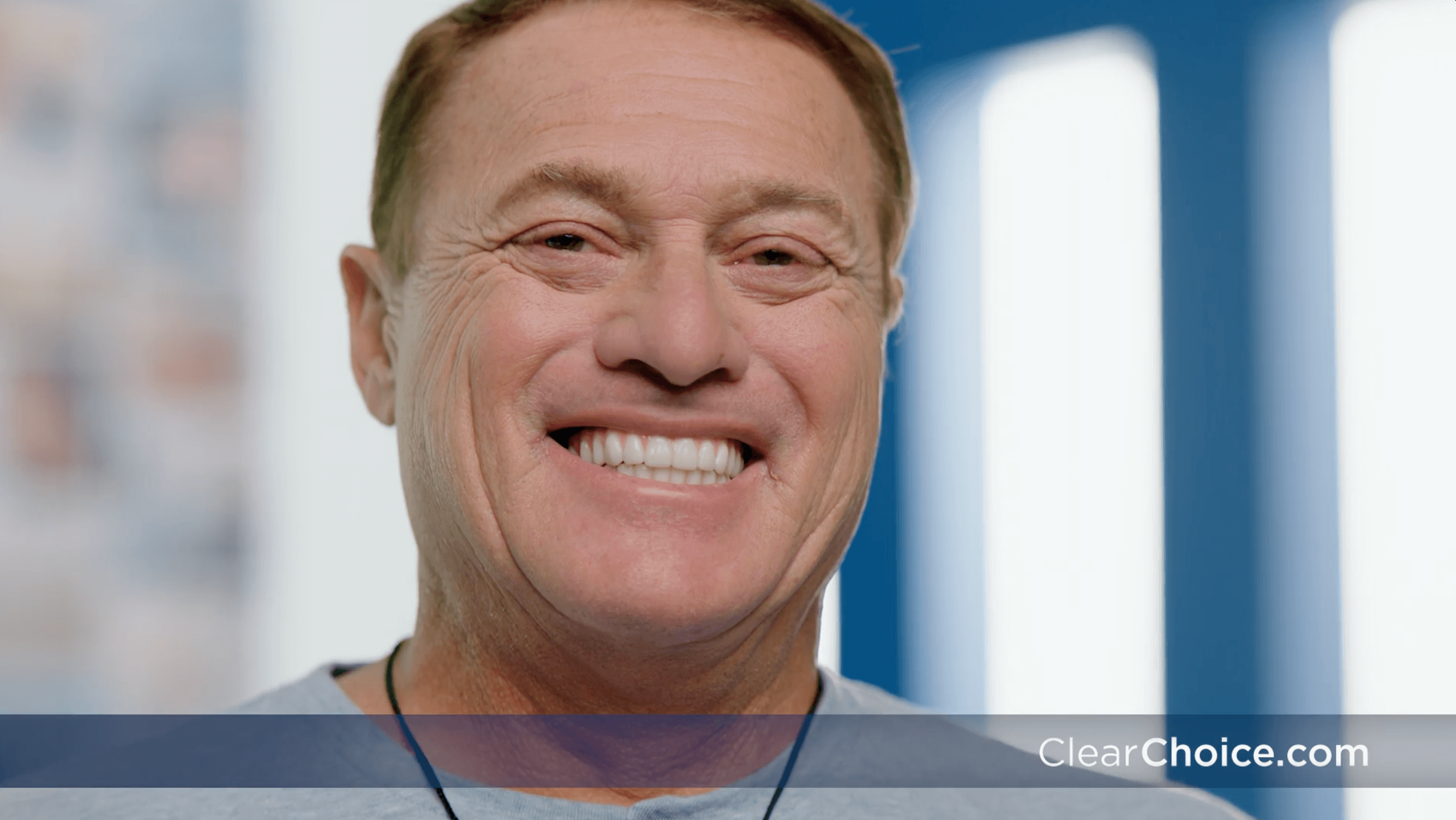 Dental patient smiling on set
