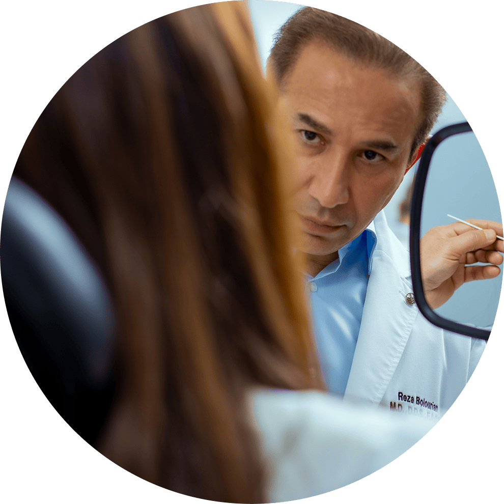 Dr. Bolourian working with a patient