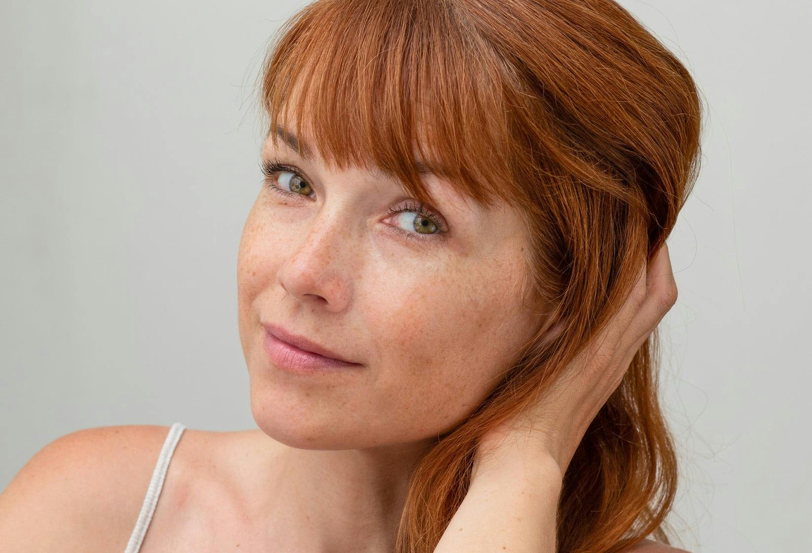 Red head woman smiling