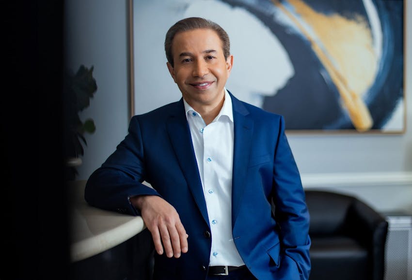 Doctor leaning on counter