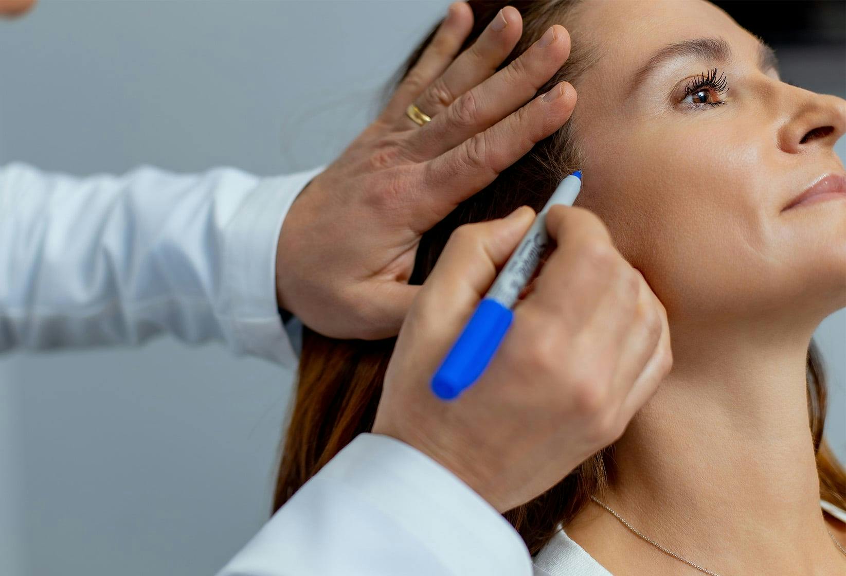 Doctor inspecting patient