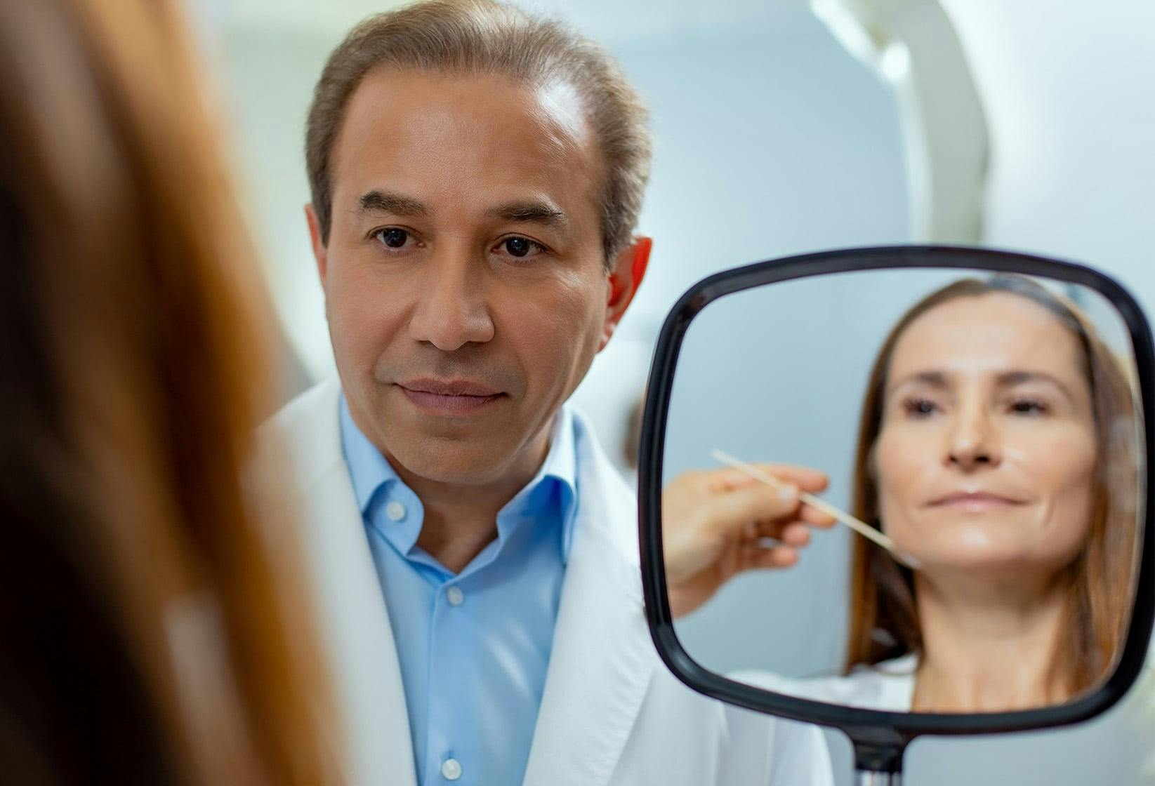 Doctor inspecting patient