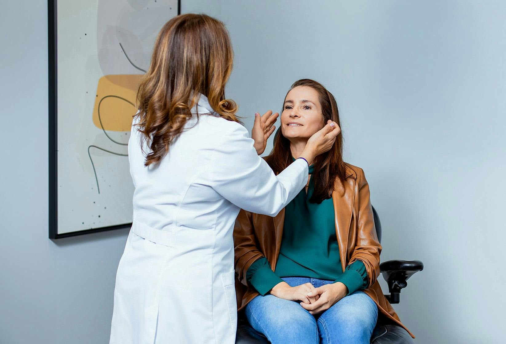 Doctor inspecting patient