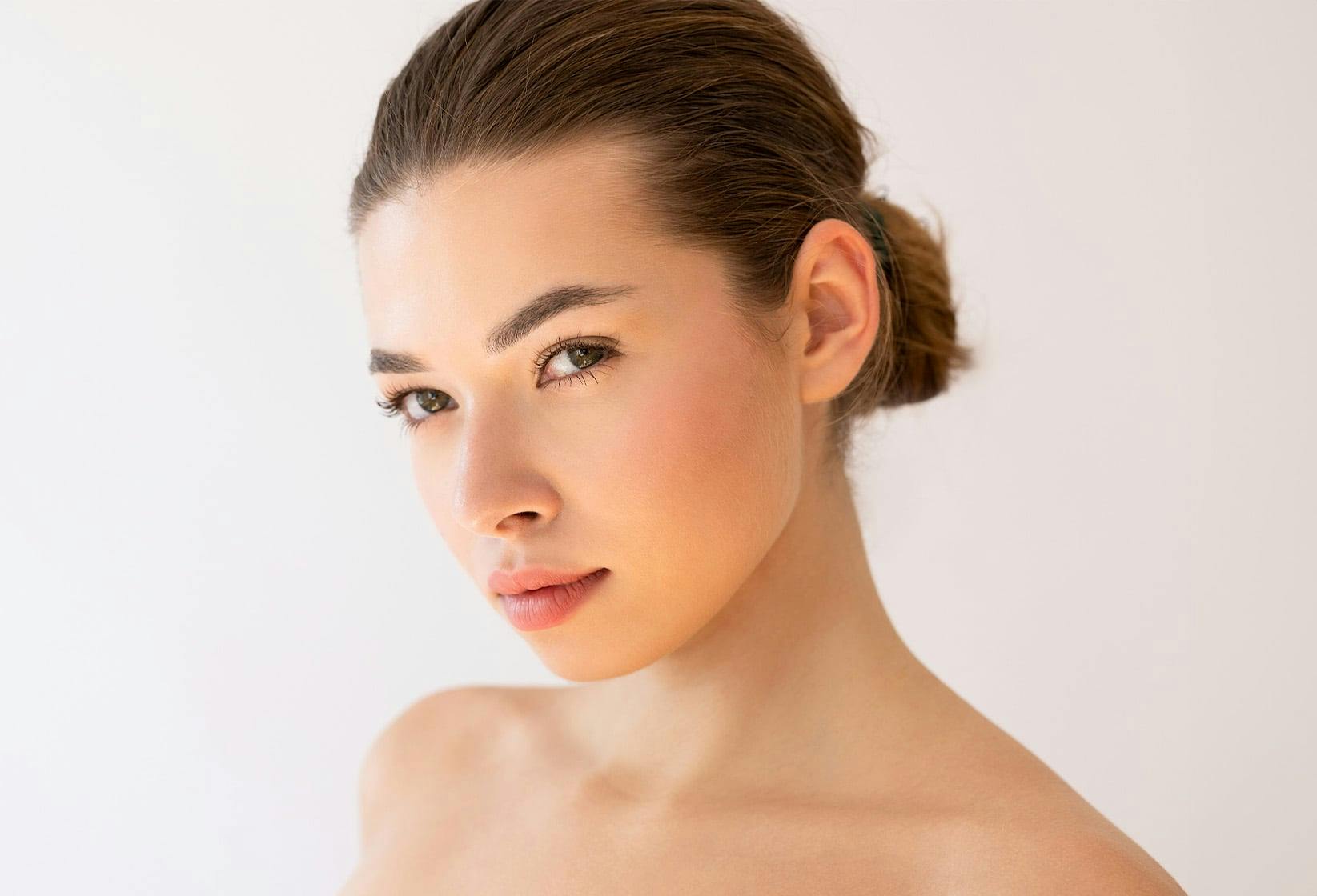 Brunette woman smirking